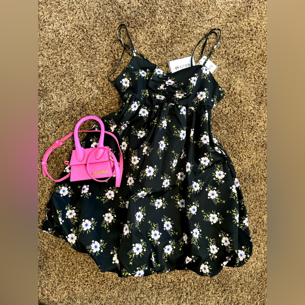 in A Bubble Mini Dress in Black
by Free People